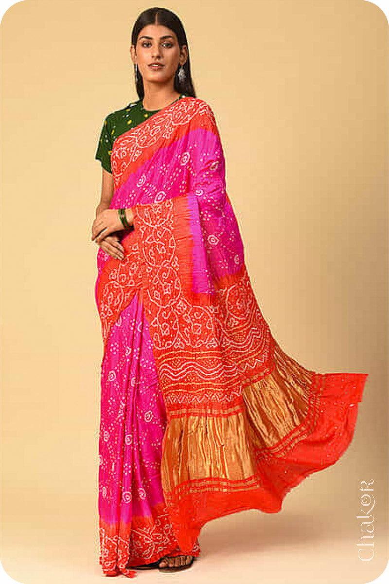 Chakor's traditional Pink Orange bandhani pure silk saree with mukaish embroidery.