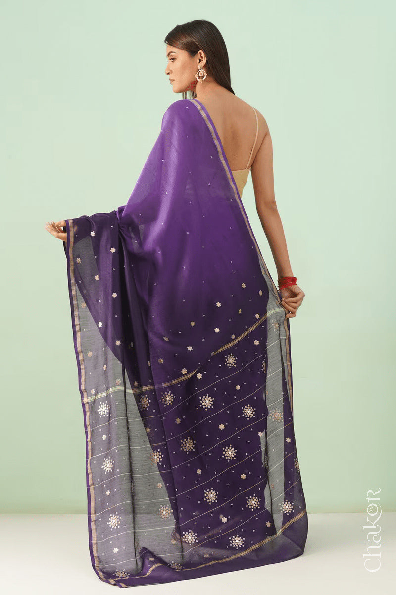 Back view of violet purple shaded Chanderi silk cotton saree displaying ombre dyeing and tissue pallu.
