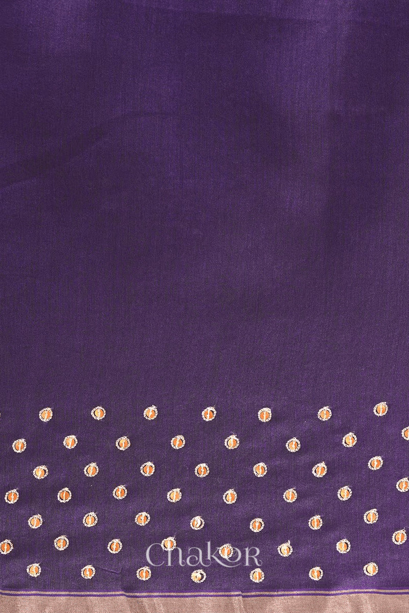 Detail of unstitched blouse piece and scattered sequin embroidery on violet purple Chanderi silk cotton saree.

