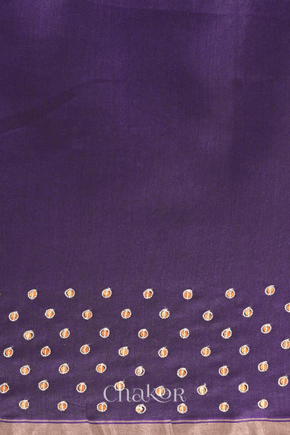 Detail of unstitched blouse piece and scattered sequin embroidery on violet purple Chanderi silk cotton saree.
