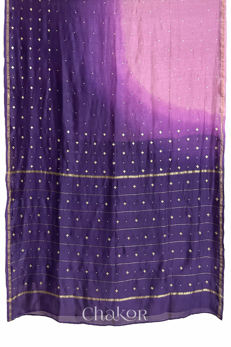 Flat view of pink purple shaded Chanderi silk cotton saree showing ombre transition and border finish.
