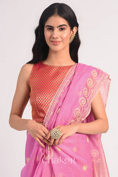 Front close view of pink Chanderi silk cotton saree highlighting aari embroidery details.
