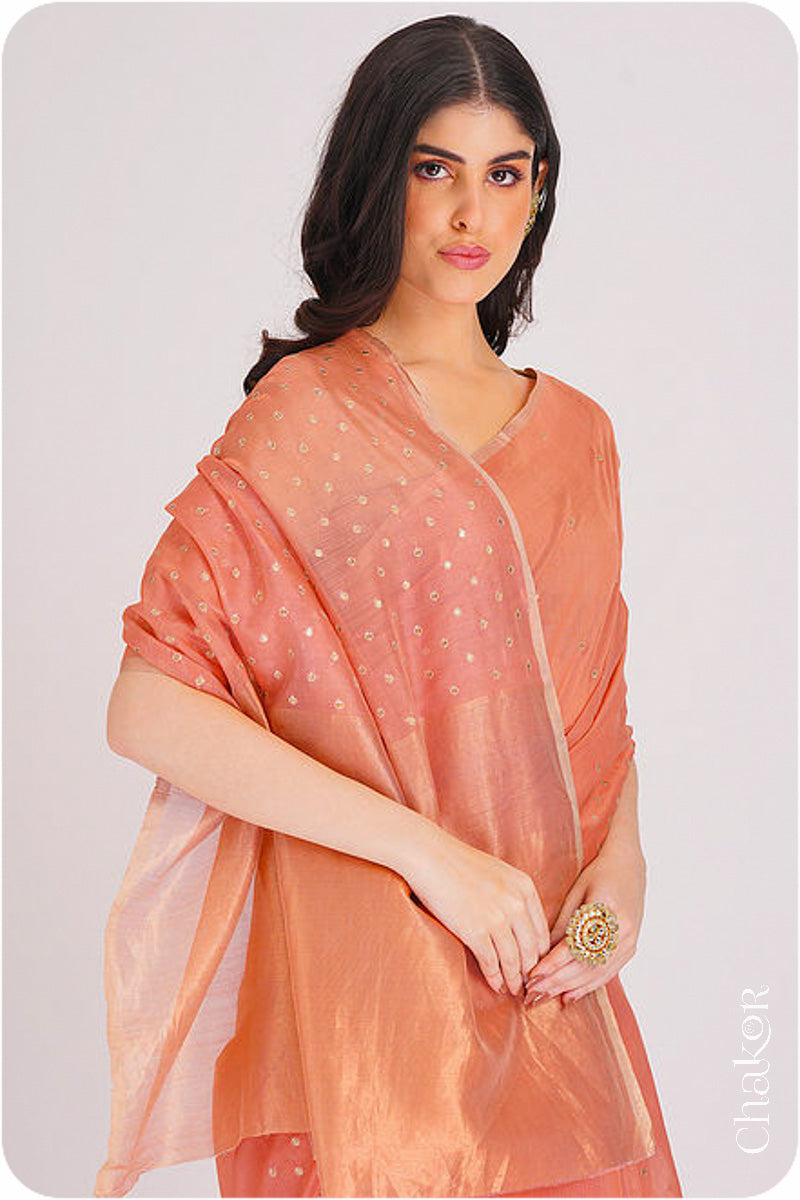 Chakor's Peach Handloom Silk Cotton Saree with woven tissue pallu & delicate sequin work buttis.