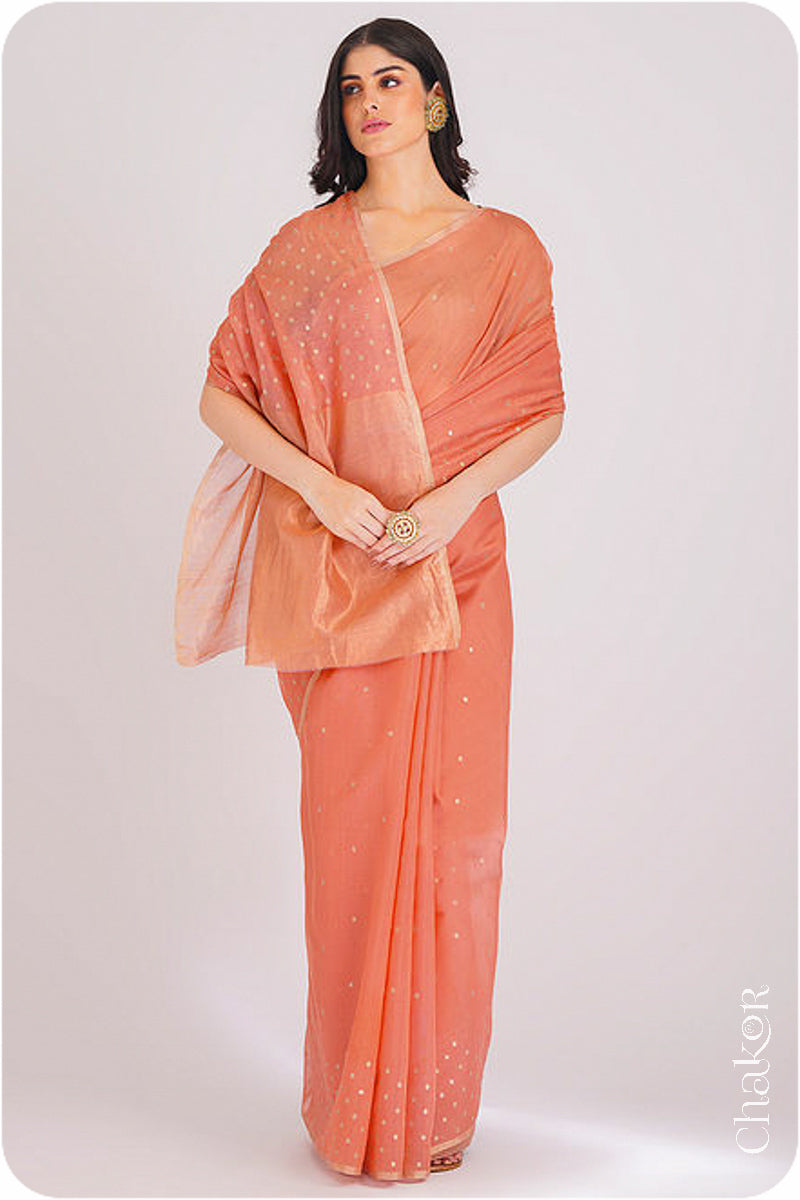 Chakor's Peach Handloom Silk Cotton Saree with woven tissue pallu & delicate sequin work buttis.