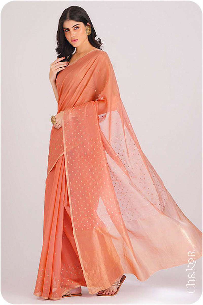 Chakor's Peach Handloom Silk Cotton Saree with woven tissue pallu & delicate sequin work buttis.