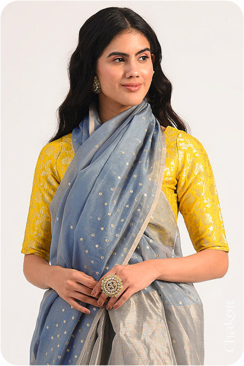 Chakor's Grey Handloom Silk Cotton Saree with woven tissue pallu & delicate sequin work buttis.