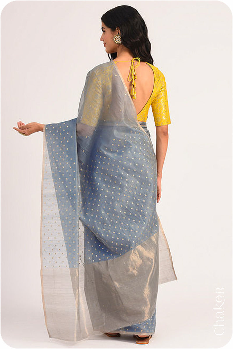 Chakor's Grey Handloom Silk Cotton Saree with woven tissue pallu & delicate sequin work buttis.