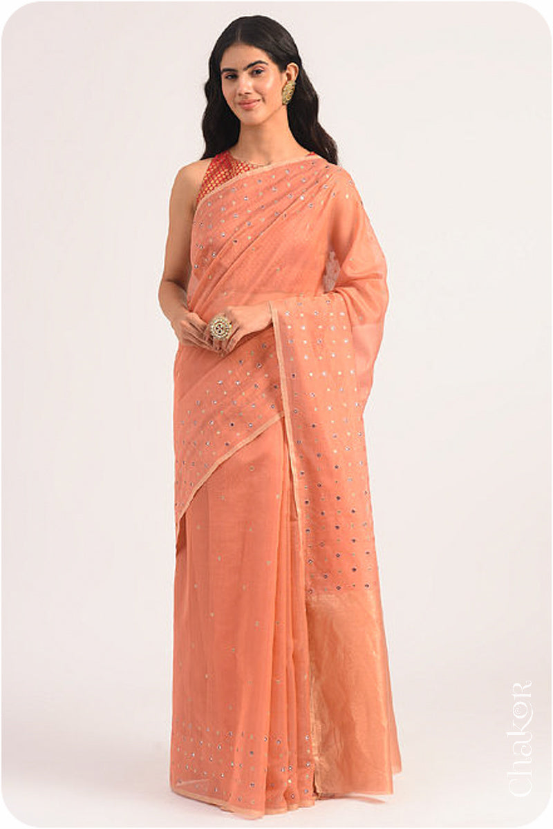 Chakor's Rust Handloom Silk Cotton Saree with woven tissue pallu & delicate mirror & sequin work buttis.