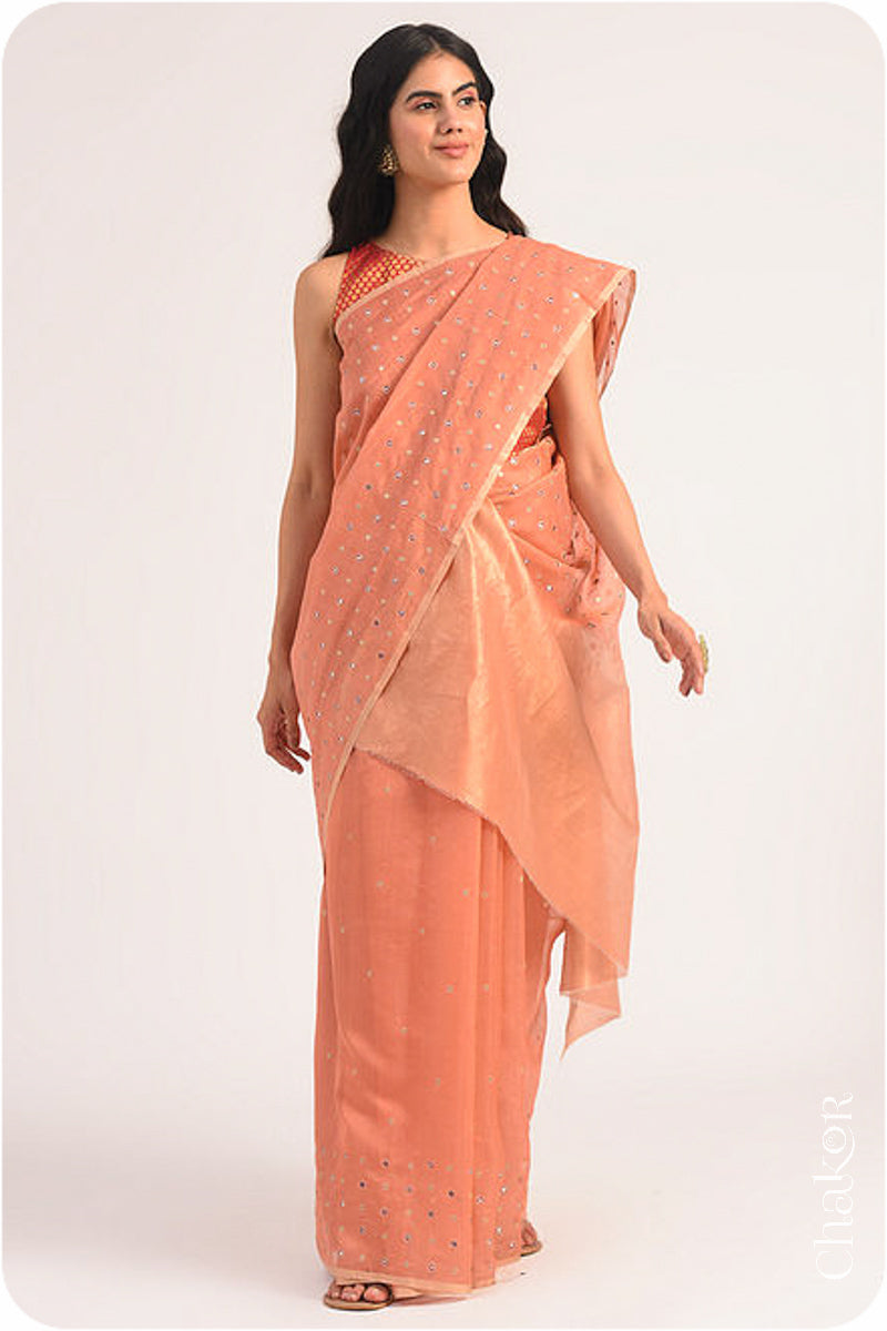 Chakor's Rust Handloom Silk Cotton Saree with woven tissue pallu & delicate mirror & sequin work buttis.