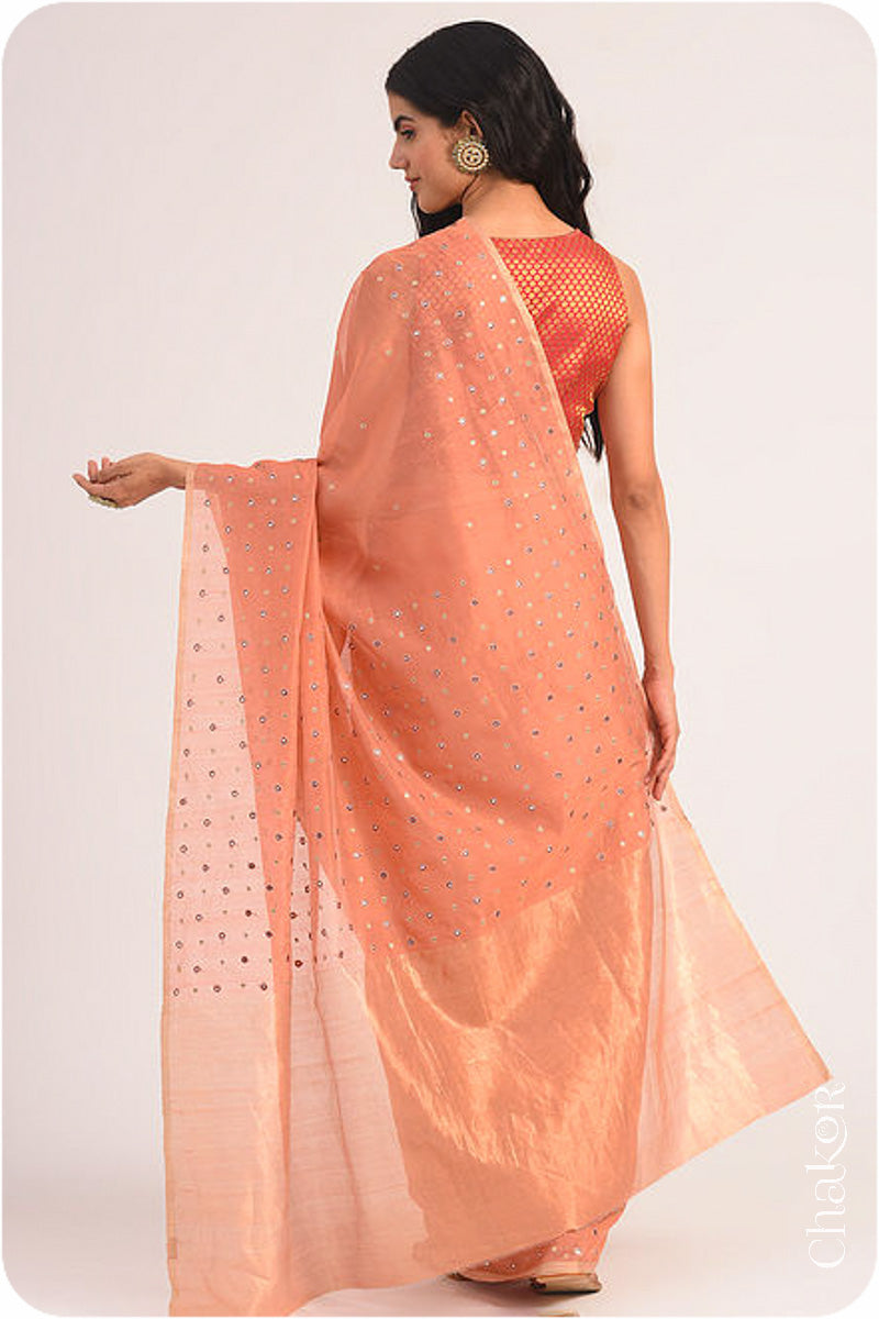 Chakor's Rust Handloom Silk Cotton Saree with woven tissue pallu & delicate mirror & sequin work buttis.