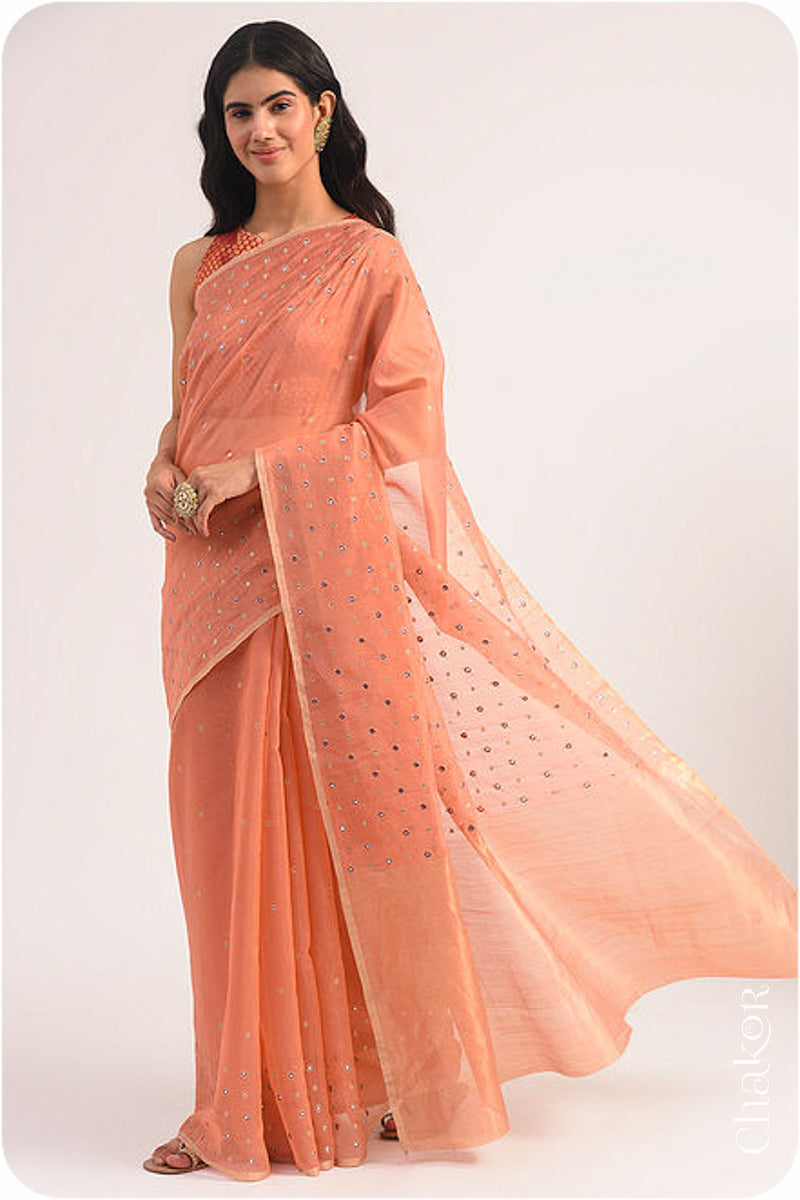 Chakor's Rust Handloom Silk Cotton Saree with woven tissue pallu & delicate mirror & sequin work buttis.