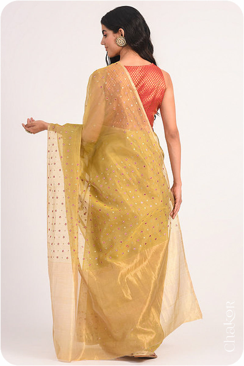 Chakor's Mustard Handloom Silk Cotton Saree with woven tissue pallu & delicate mirror & sequin work buttis.