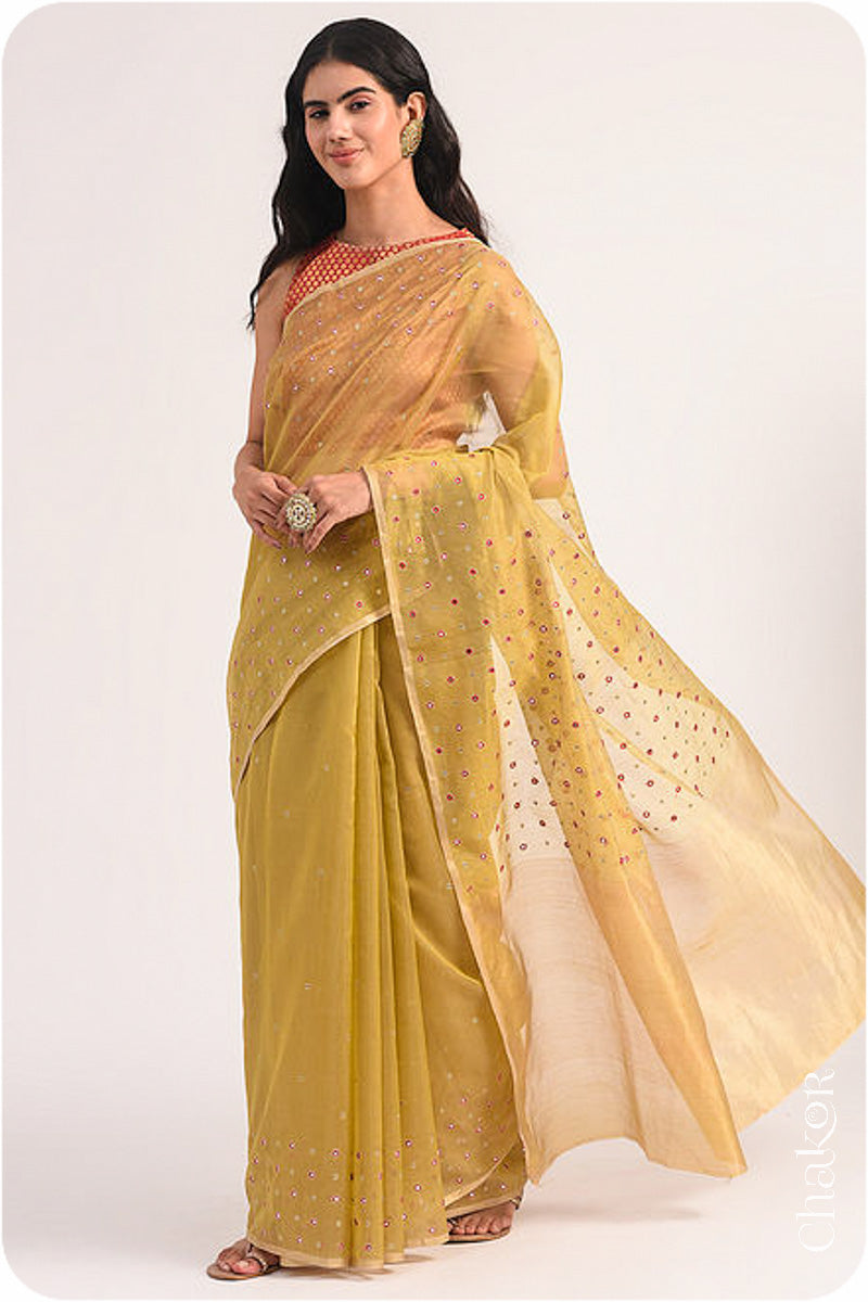 Chakor's Mustard Handloom Silk Cotton Saree with woven tissue pallu & delicate mirror & sequin work buttis.