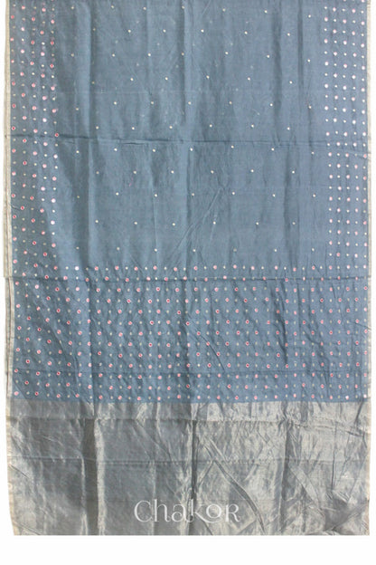 Chakor's Grey Handloom Silk Cotton Saree with woven tissue pallu & delicate mirror & sequin work buttis.