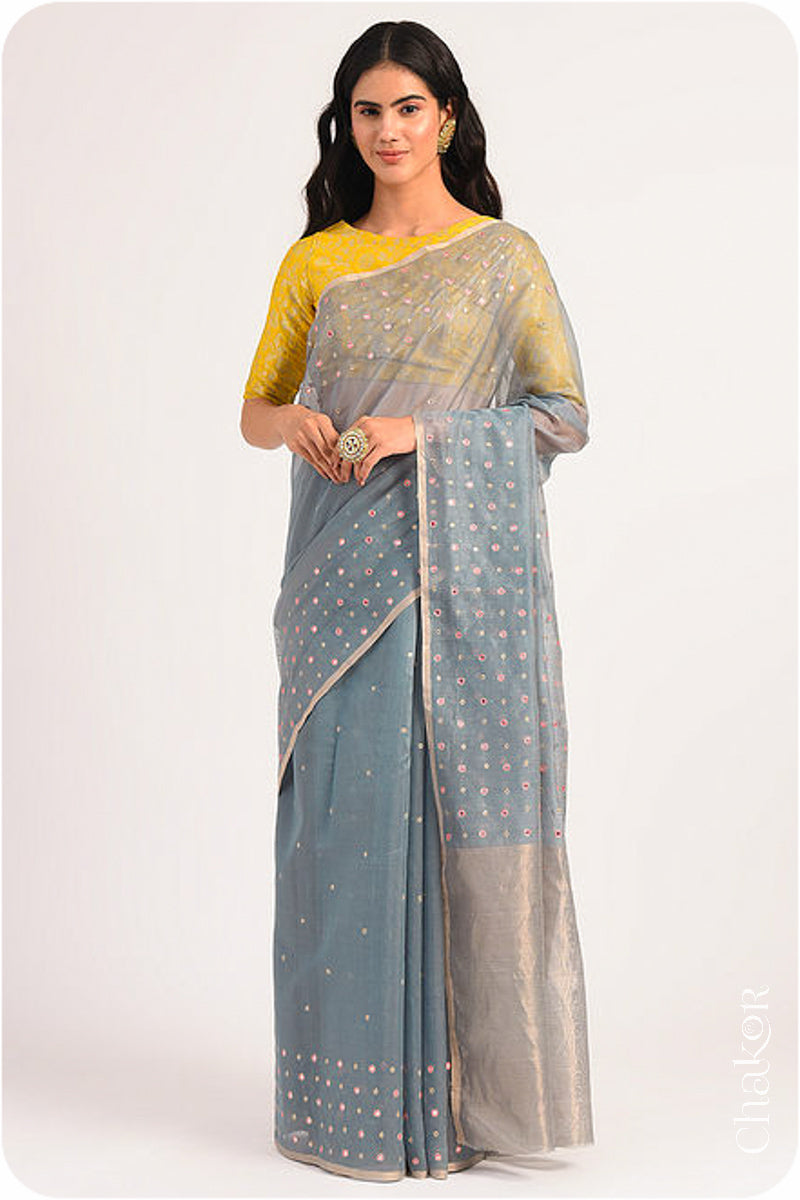 Chakor's Grey Handloom Silk Cotton Saree with woven tissue pallu & delicate mirror & sequin work buttis.