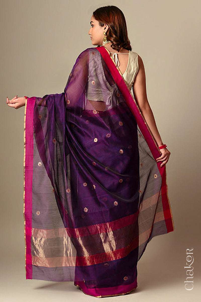 Back view of model wearing Wine Chanderi silk cotton saree with tissue-striped pallu displayed.

