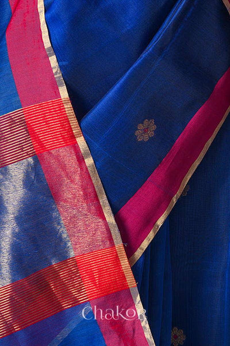 Close-up of Ganga Jamuna border and phool butti weave on Blue Chanderi silk cotton fabric.
