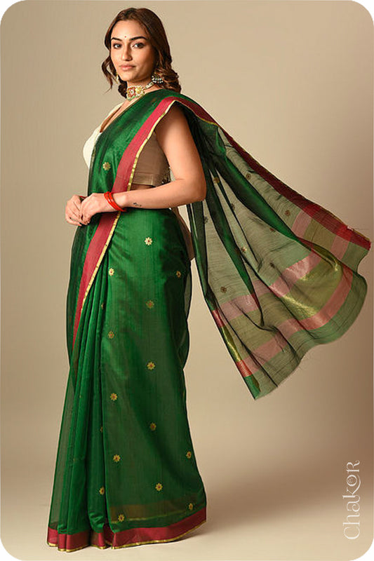 Chakor's Traditional Green Chanderi silk cotton saree with zari butti and ganga-jamuna borders.