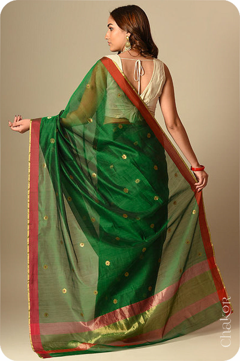 Chakor's Traditional Green Chanderi silk cotton saree with zari butti and ganga-jamuna borders.