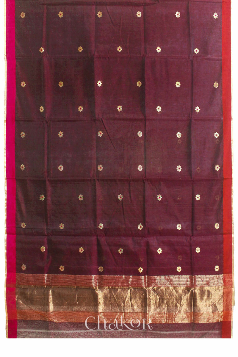 Flatshot of Maroon Chanderi silk cotton saree showing phool butti motifs and contrasting borders.
