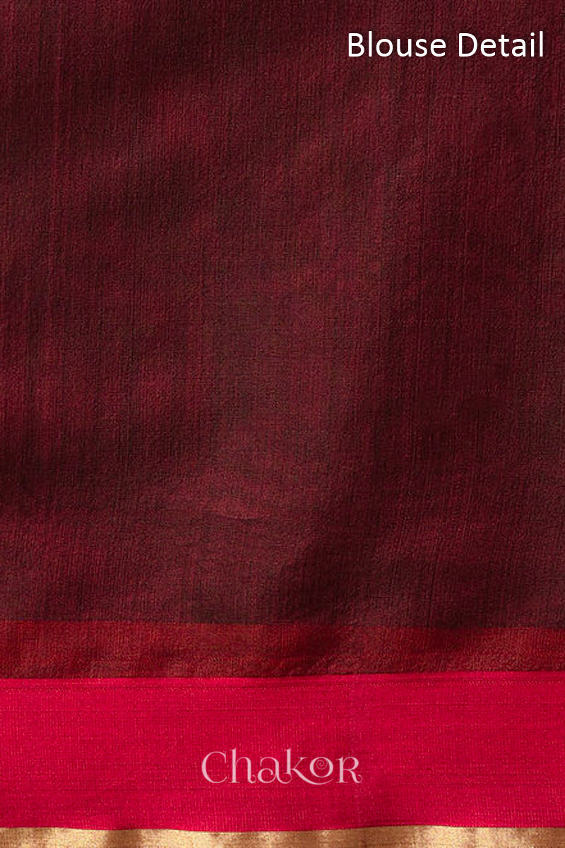 Maroon Chanderi silk cotton blouse piece with woven texture.
