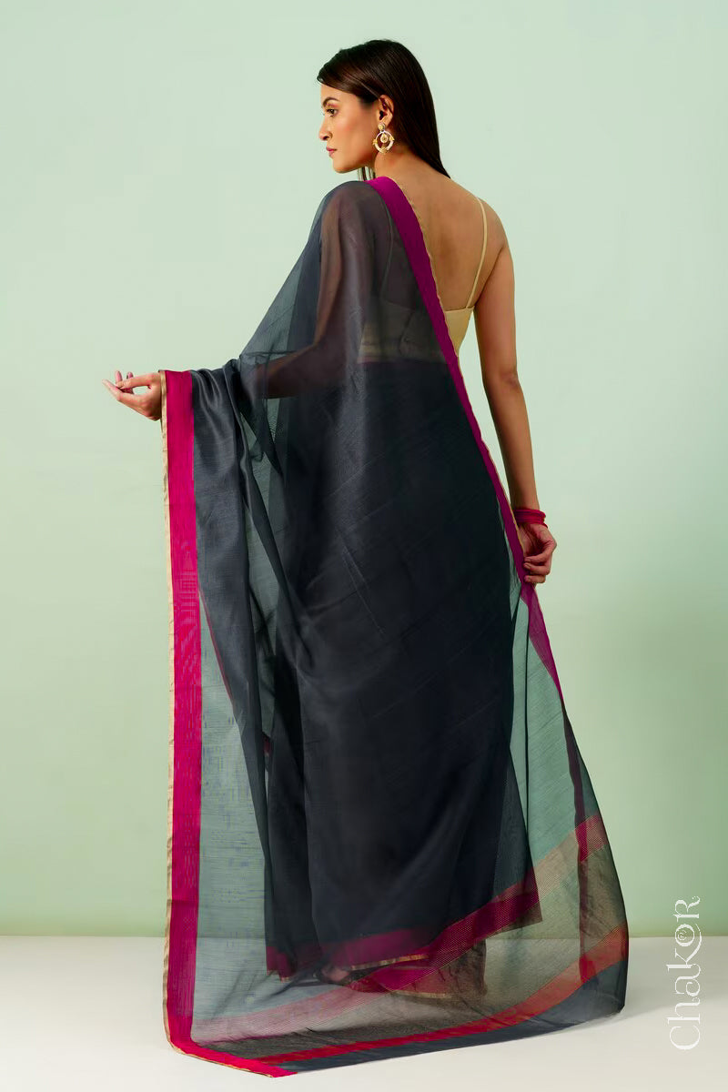 Handwoven Black Chanderi silk cotton saree with tissue pallu displayed from the back.
