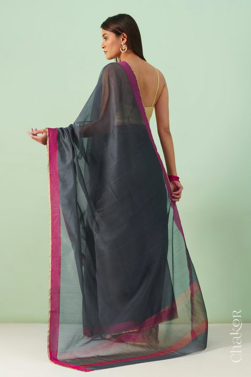 Handwoven Grey Chanderi silk cotton saree with tissue pallu displayed from the back.

