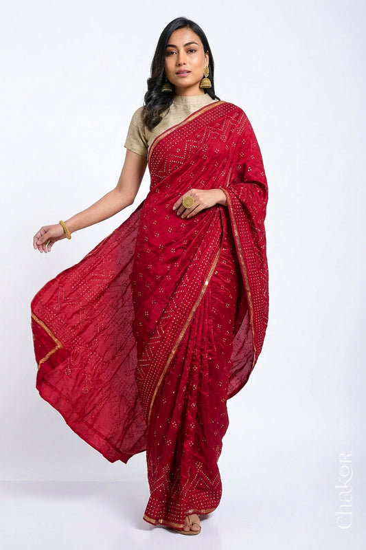 Model wearing Red Bandhani Mulberry Silk Saree with sequins embroidery.