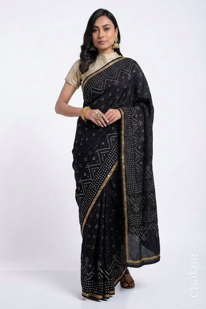 Model wearing Black Bandhani Mulberry Silk Saree with sequins embroidery.