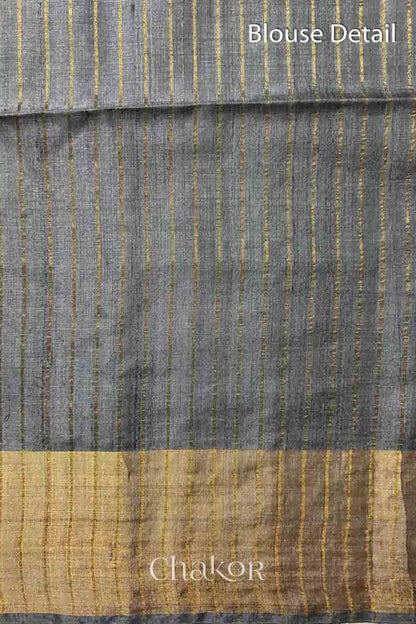 Close up of Blouse of Grey tussar silk handloom saree with golden zari border & hand embroidered with  sequins & zari work
