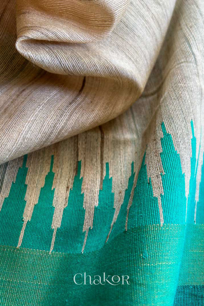 close up of a traditional Jade Green and Natural tussar silk handloom temple border saree