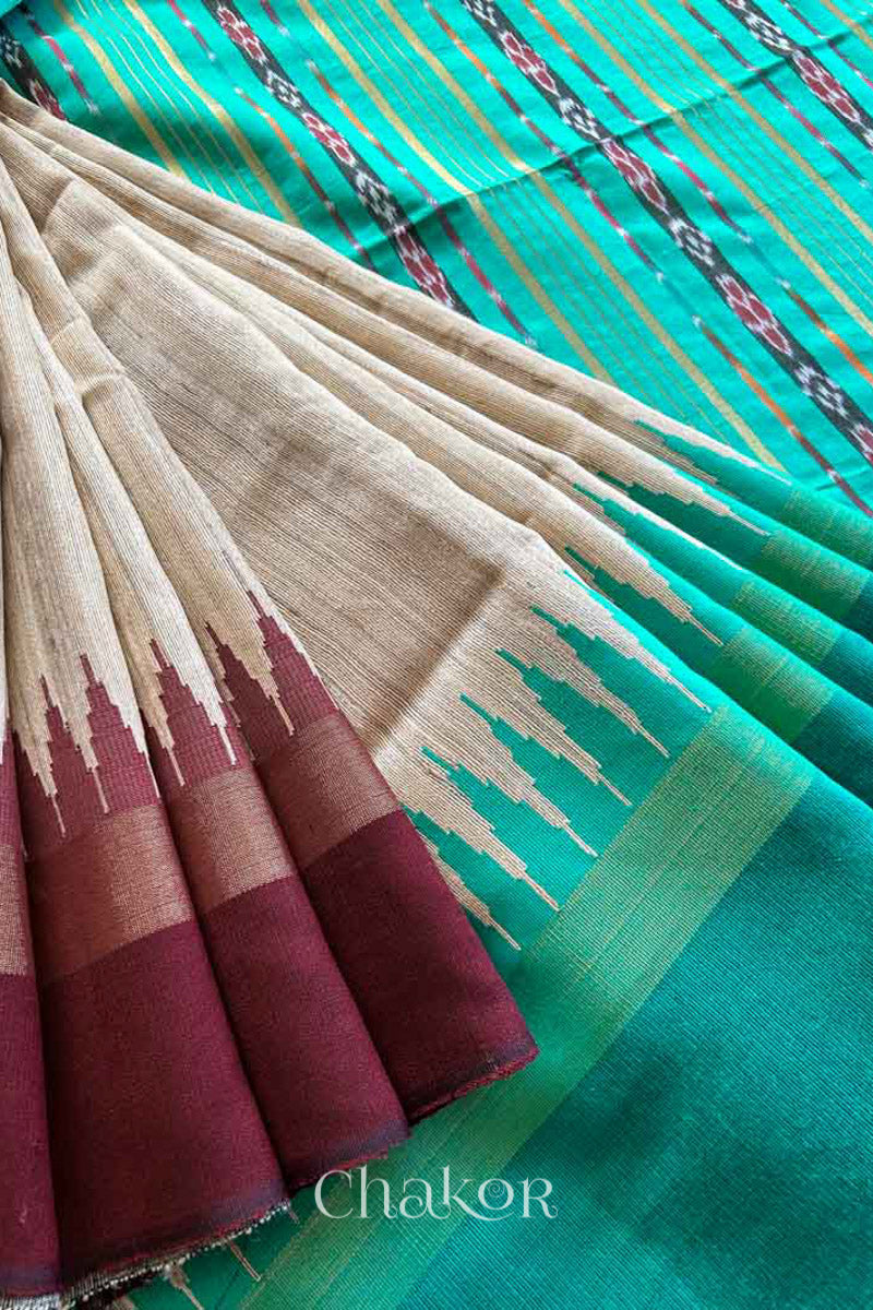 close up of a traditional Jade Green and Natural tussar silk handloom temple border saree