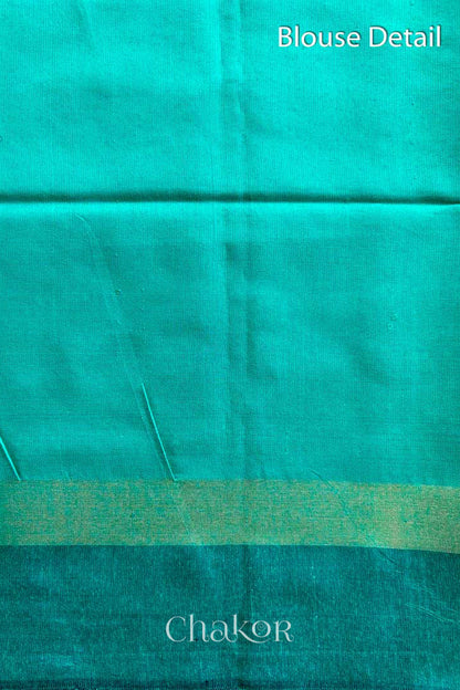 close up of Blouse of a traditional Jade Green and Natural tussar silk handloom temple border saree