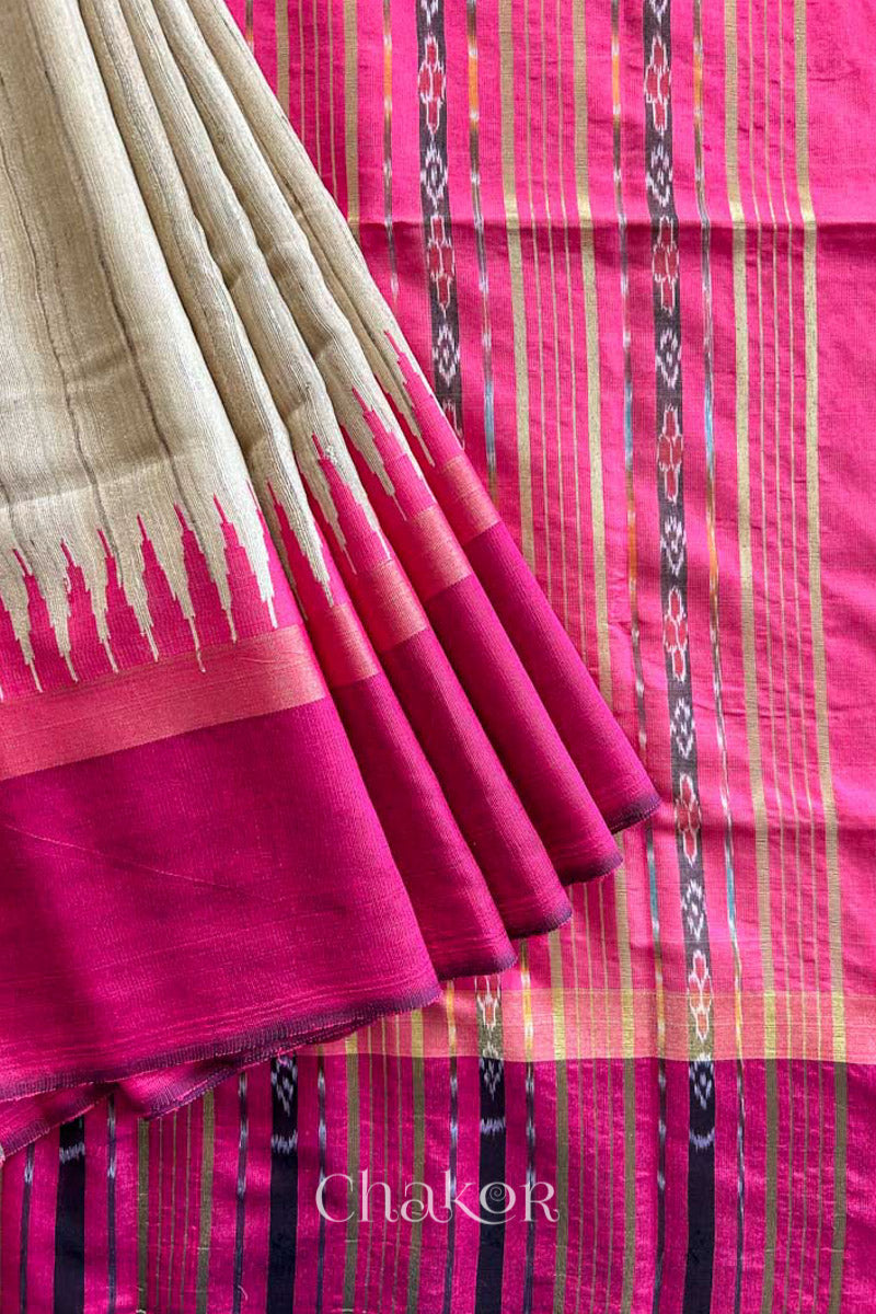 close up of a traditional pink and Natural tussar silk handloom temple border saree