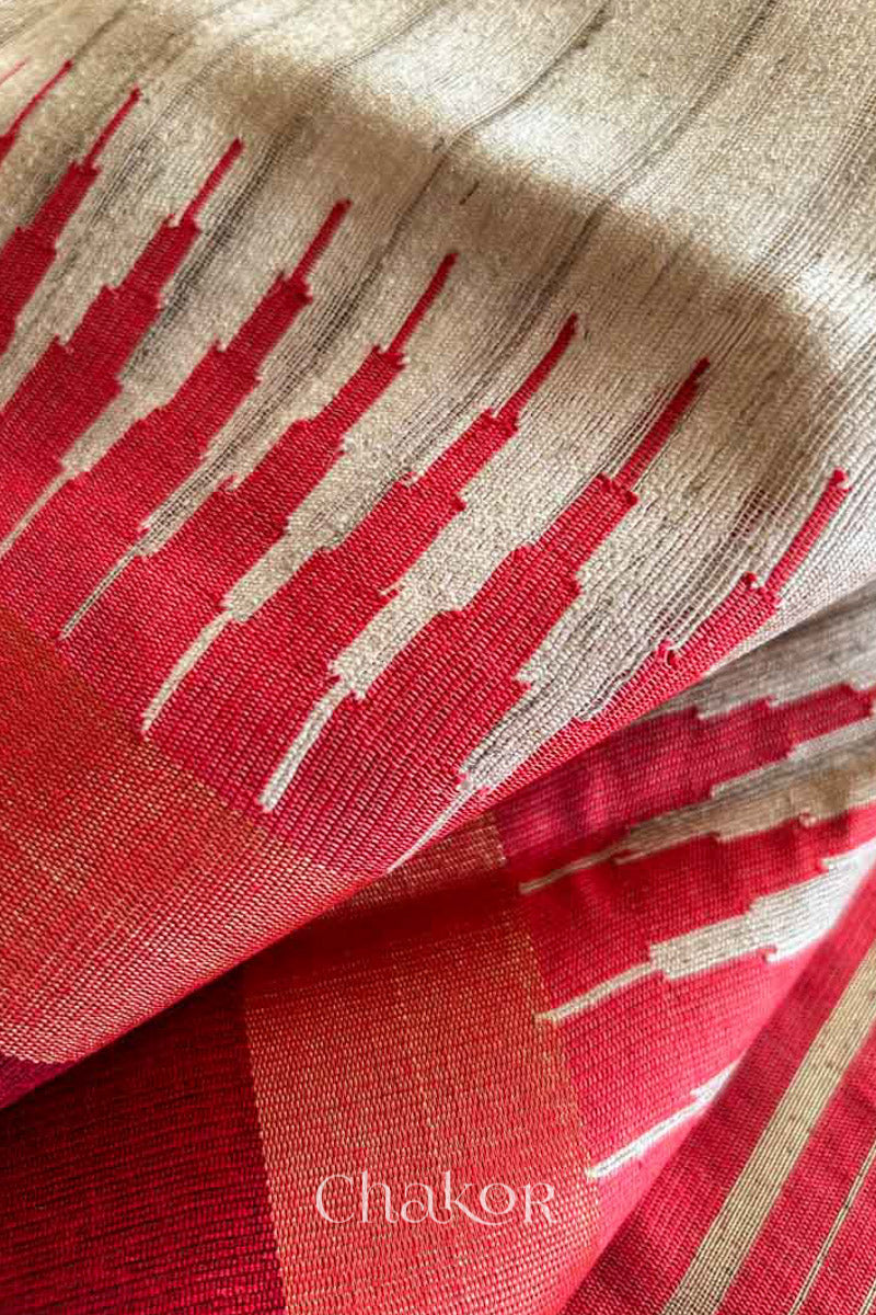 Close up of Traditional red and Natural tussar silk handloom temple border saree.