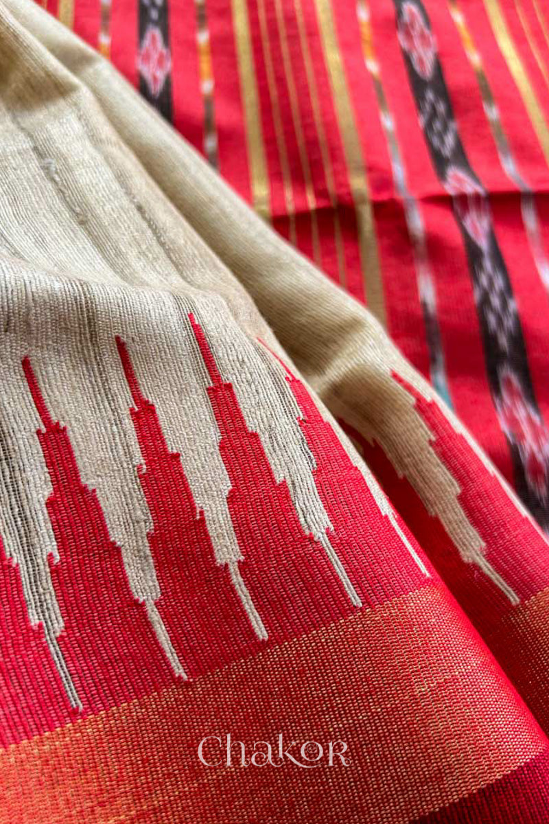 Close up of Traditional red and Natural tussar silk handloom temple border saree.
