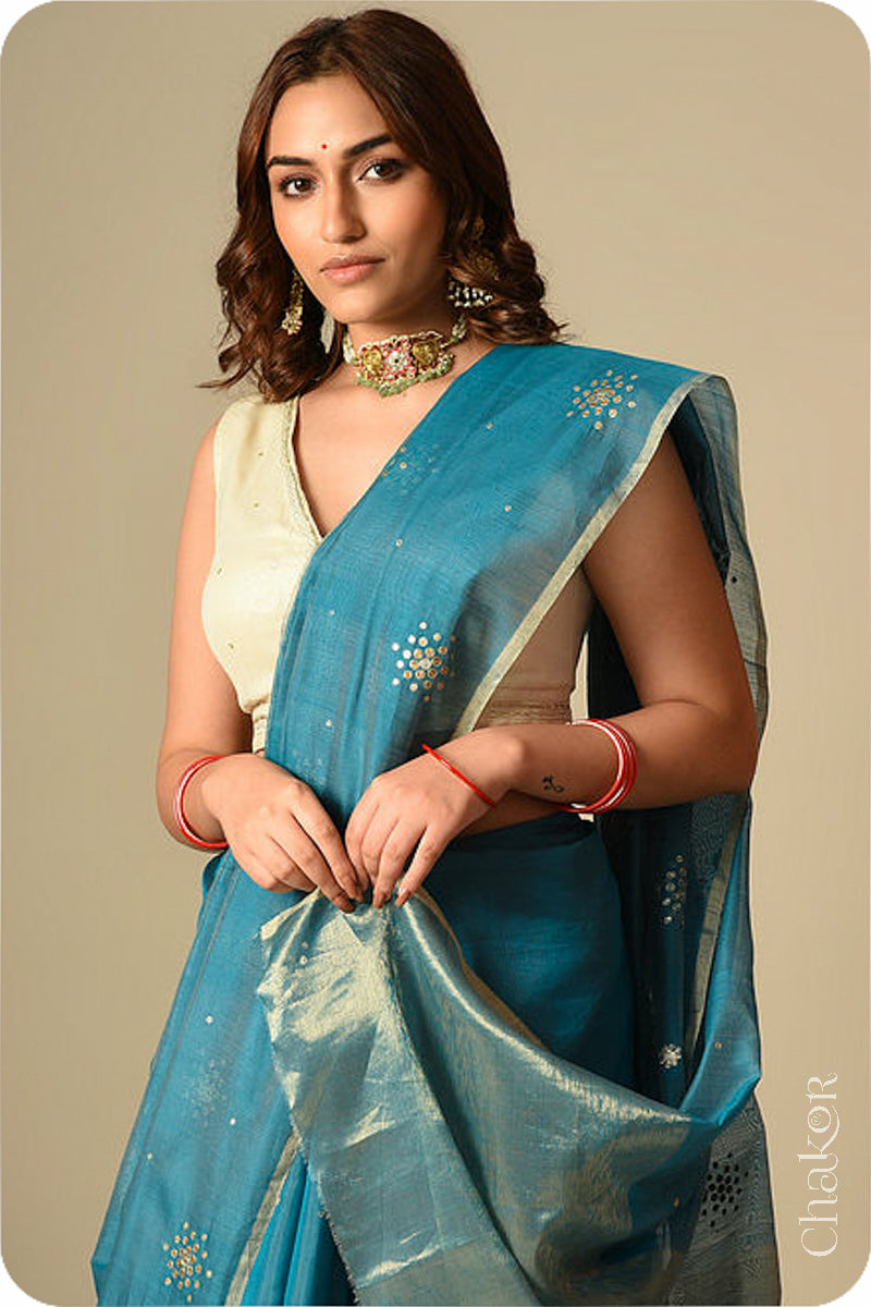 Chakor's Traditional Peacock Blue Chanderi silk cotton saree with sequins embroidery.