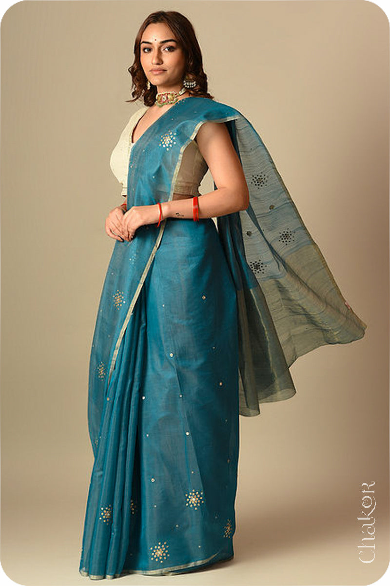 Chakor's Traditional Peacock Blue Chanderi silk cotton saree with sequins embroidery.