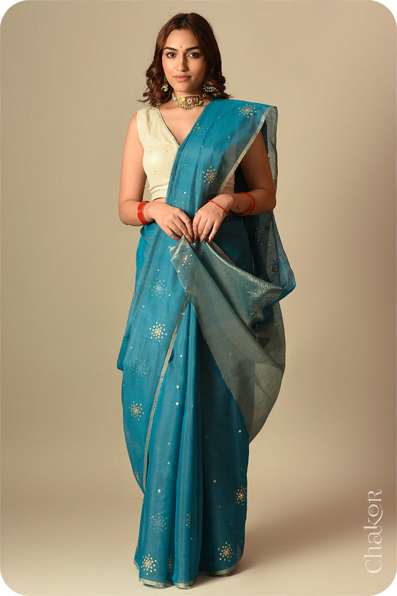 Chakor's Traditional Peacock Blue Chanderi silk cotton saree with sequins embroidery.