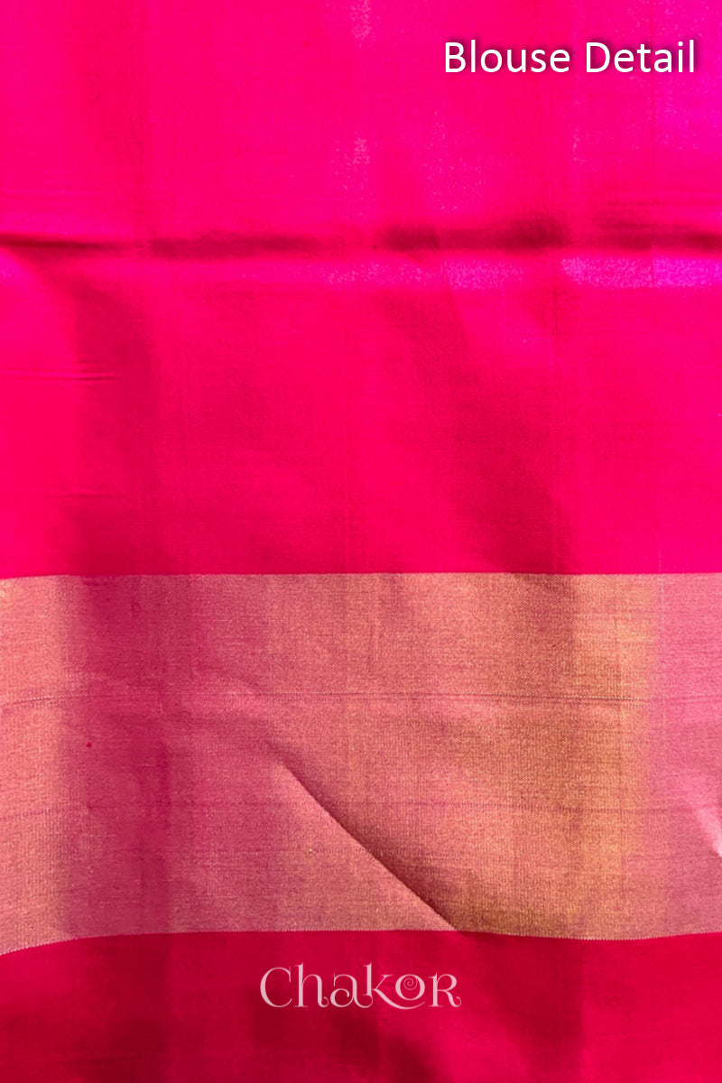 Blouse piece of Handloom Rani Pink Rajkoti Patola Ikat Mulberry Silk Saree with tissue borders, and mauve pallu woven using traditional designs in Gujarat.