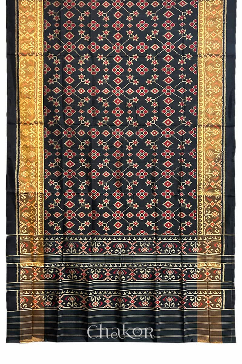 Full view of Handloom Black Patola Ikkat Mulberry Silk Saree with traditional patterns in red floral motifs.