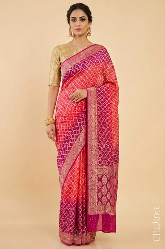 Woman wearing Handcrafted Pink and peach ombre shaded Bandhani Banarasi Georgette Silk Saree featuring zari weaving and Kutch Bandhej.