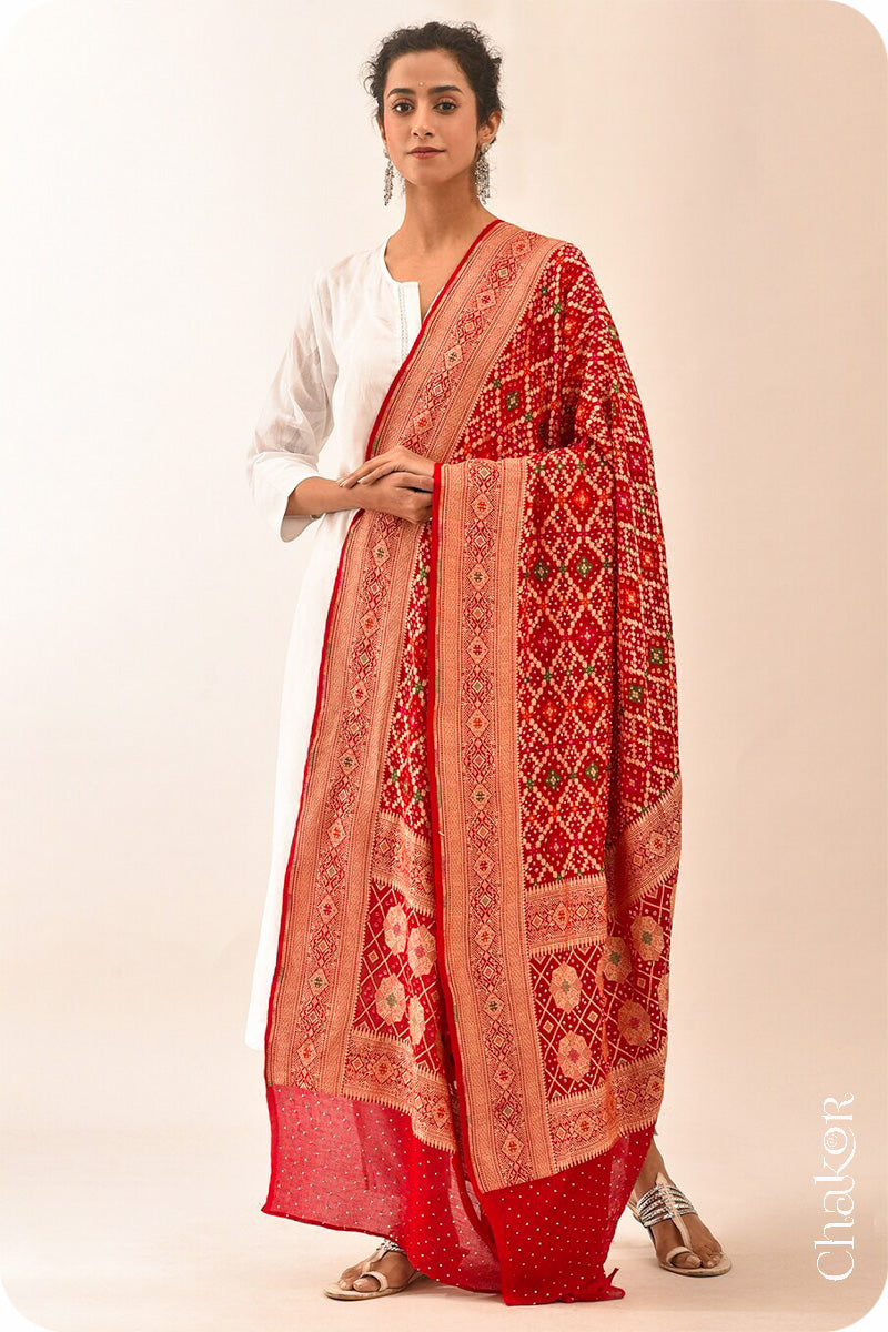 Chakor's Traditional Red Bandhani Banarasi Georgette Silk Dupatta embellished with mukaish work.