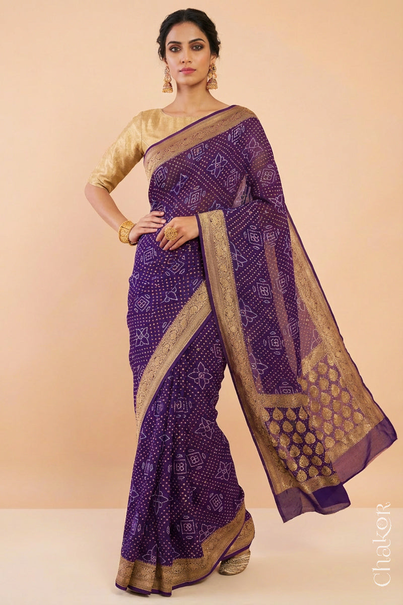 Woman wearing Handcrafted Purple Bandhani Banarasi Georgette Silk Saree featuring zari weaving and Kutch Bandhej with mirror embroidery.