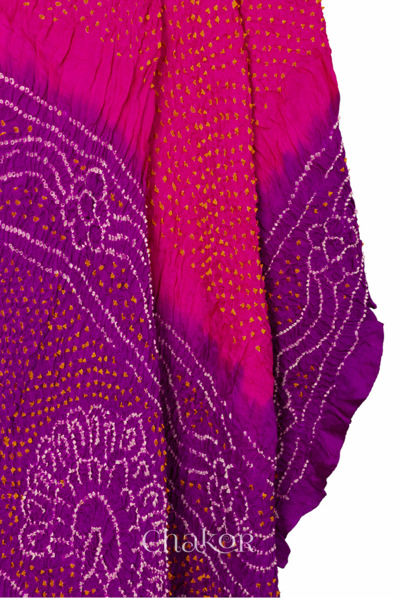 Angled detail view of pink and purple Bandhani gaji silk dupatta showing tie-dye motifs.