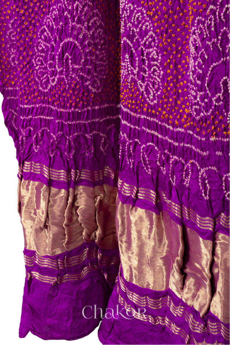 Border detail of pink and purple Bandhani gaji silk dupatta with contrast pallu and lagdi patto tissue band