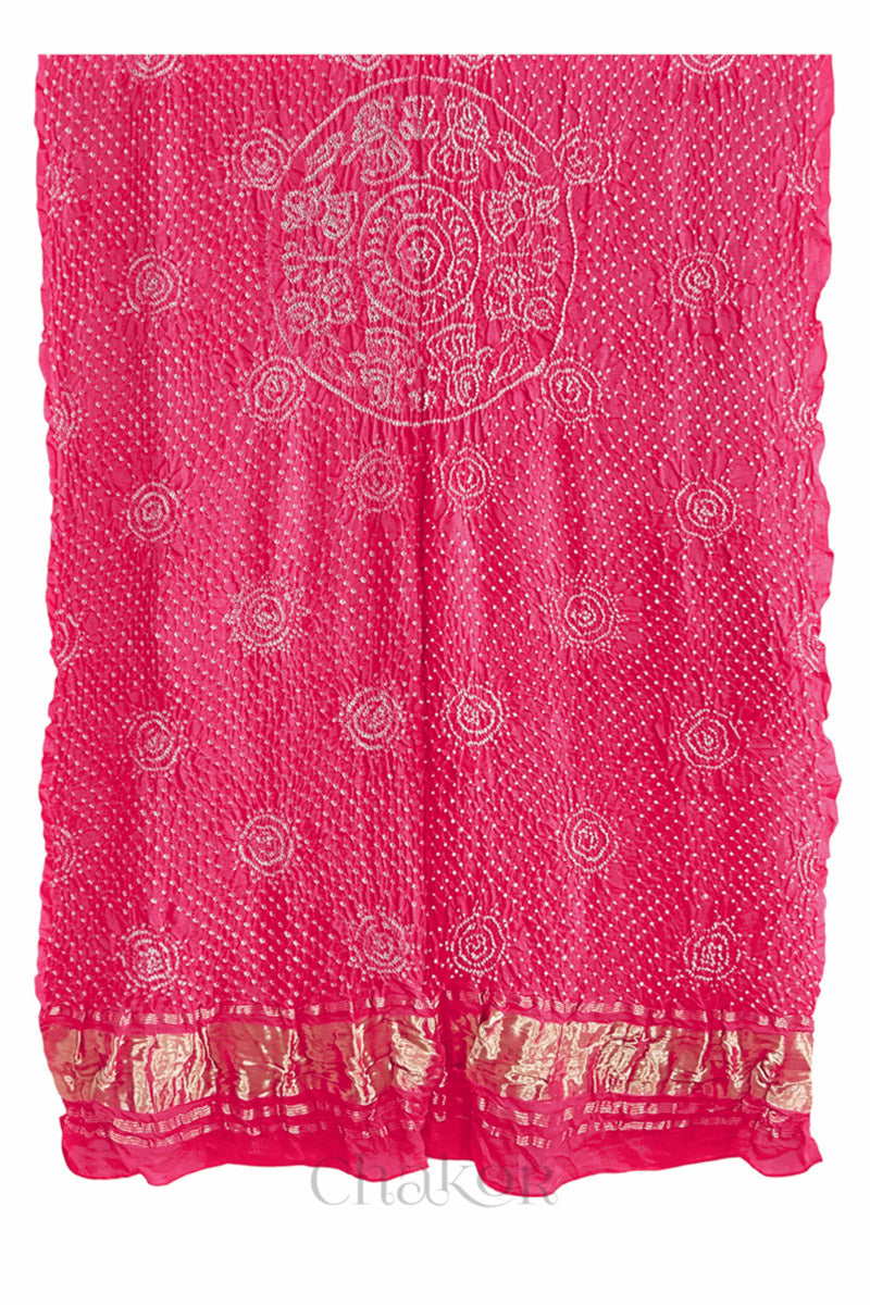 Coral Bandhani gaji silk dupatta laid flat showing Raas Mandal motifs and contrast border.