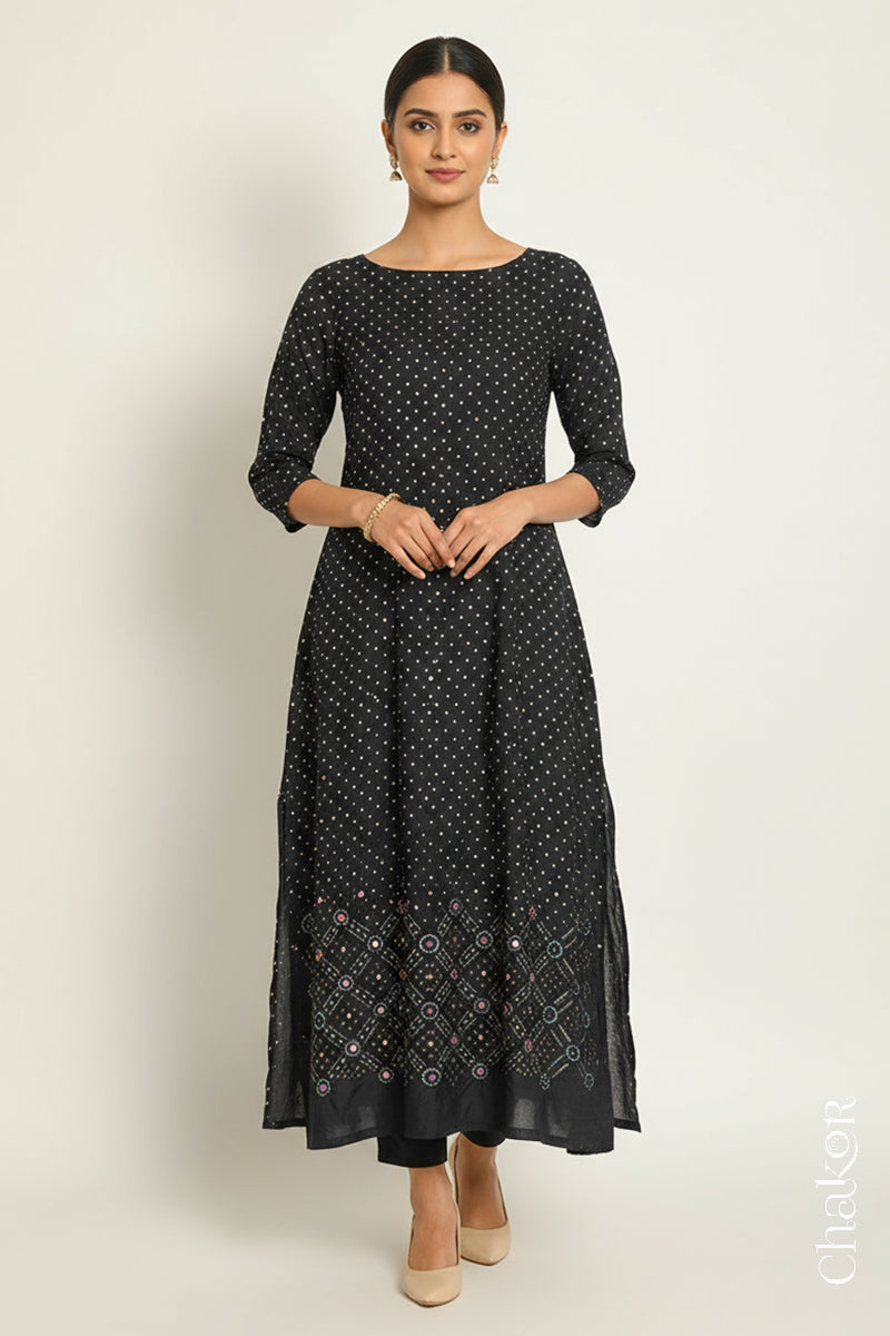 Black mulberry silk Bandhani (Rai Bandhej) kurta stitched from the fabric, featuring all-over white and mustard butis and a mirror-work hem border – CHAKOR
