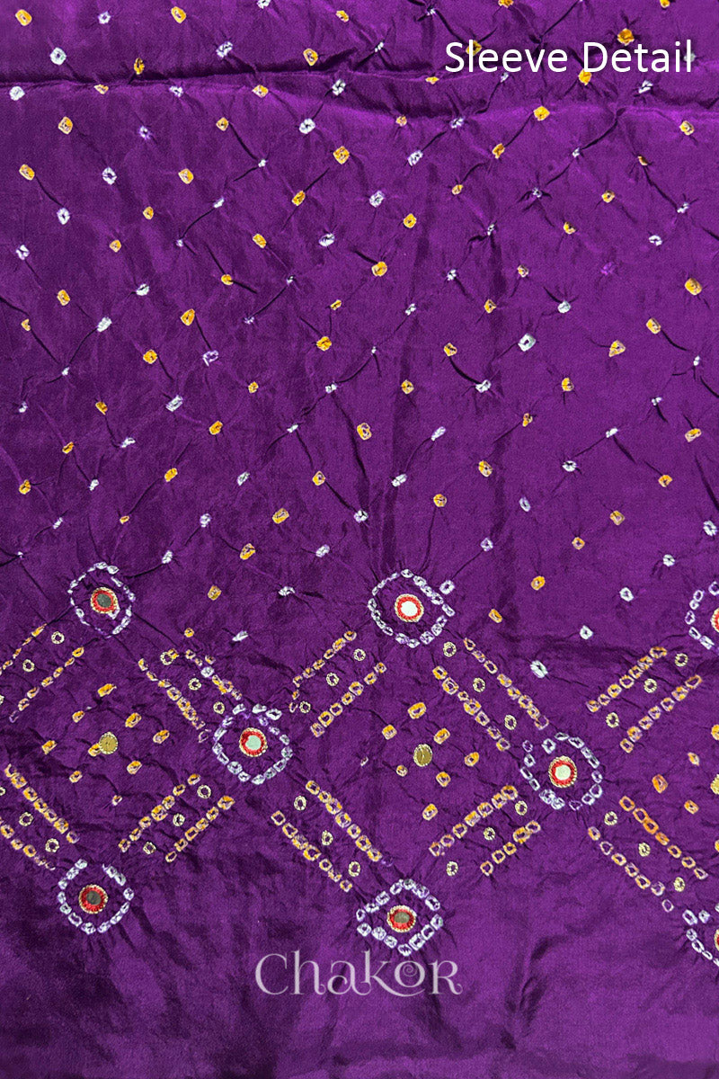 Sleeve detail of Purple mulberry silk Bandhani (Rai Bandhej) fabric with white and mustard butis, geometric bandhej borders and red mirror embroidery – CHAKOR.