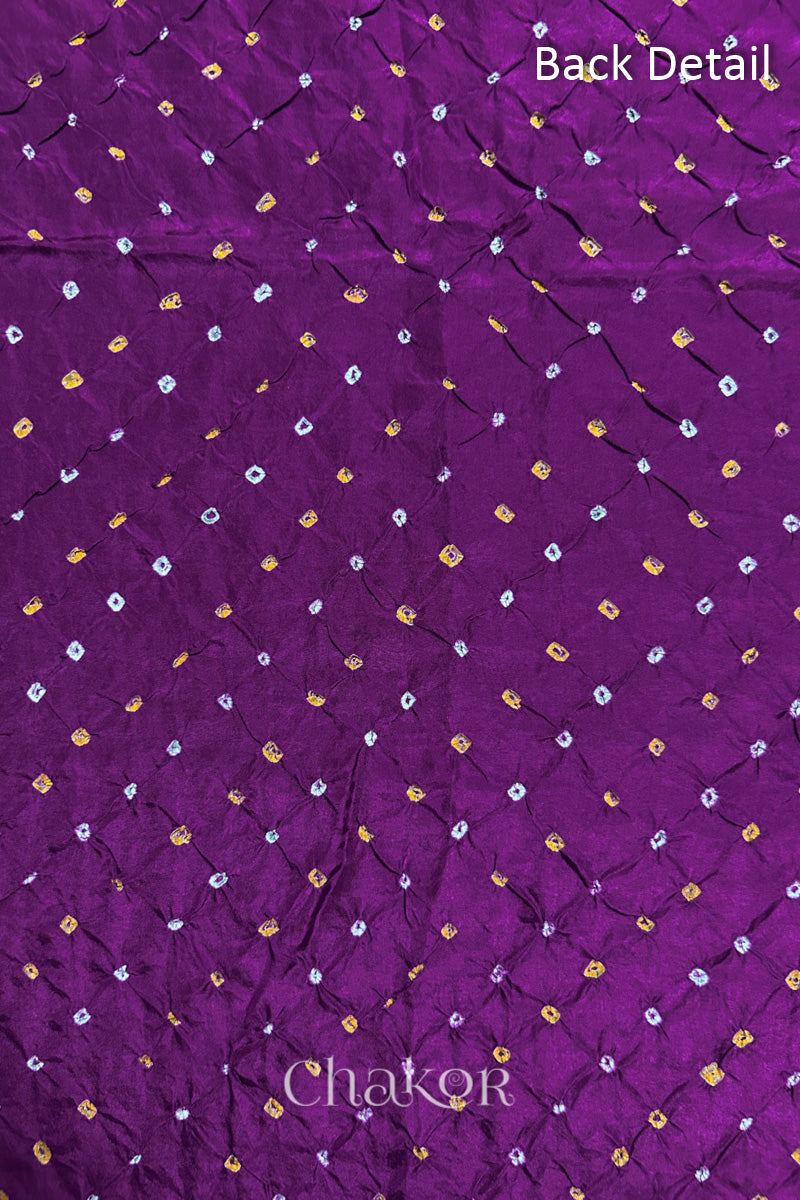 Back detail of Purple mulberry silk Bandhani (Rai Bandhej) fabric with white and mustard tie-dye butis in an all-over pattern – CHAKOR.
